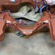 Those bumpstops are held on with rivets so they’re getting painted. Won’t hurt anything, and you can’t see them with the suspension installed, anyway.